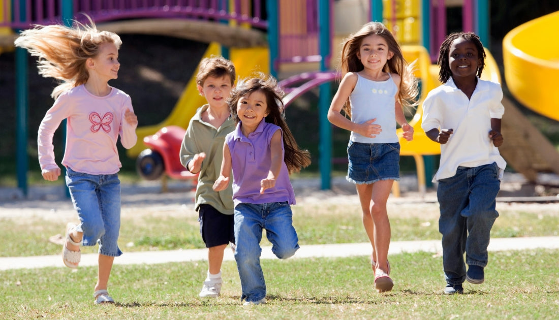 Active children playing outdoors to represent health, energy, and balanced nutrition in growing kids.