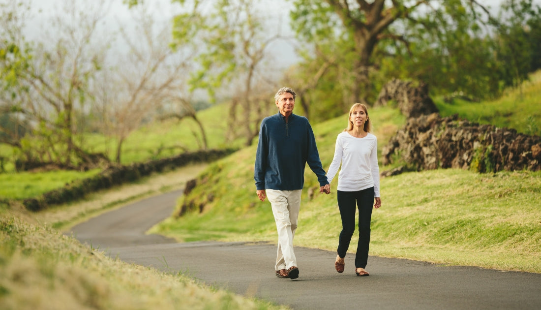 Older adults walking outdoors to support cognitive health, memory and brain health, and healthy aging.